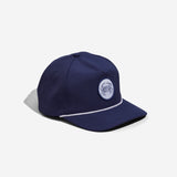 Navy baseball-style cap with white rope trim and round front patch featuring a crab illustration