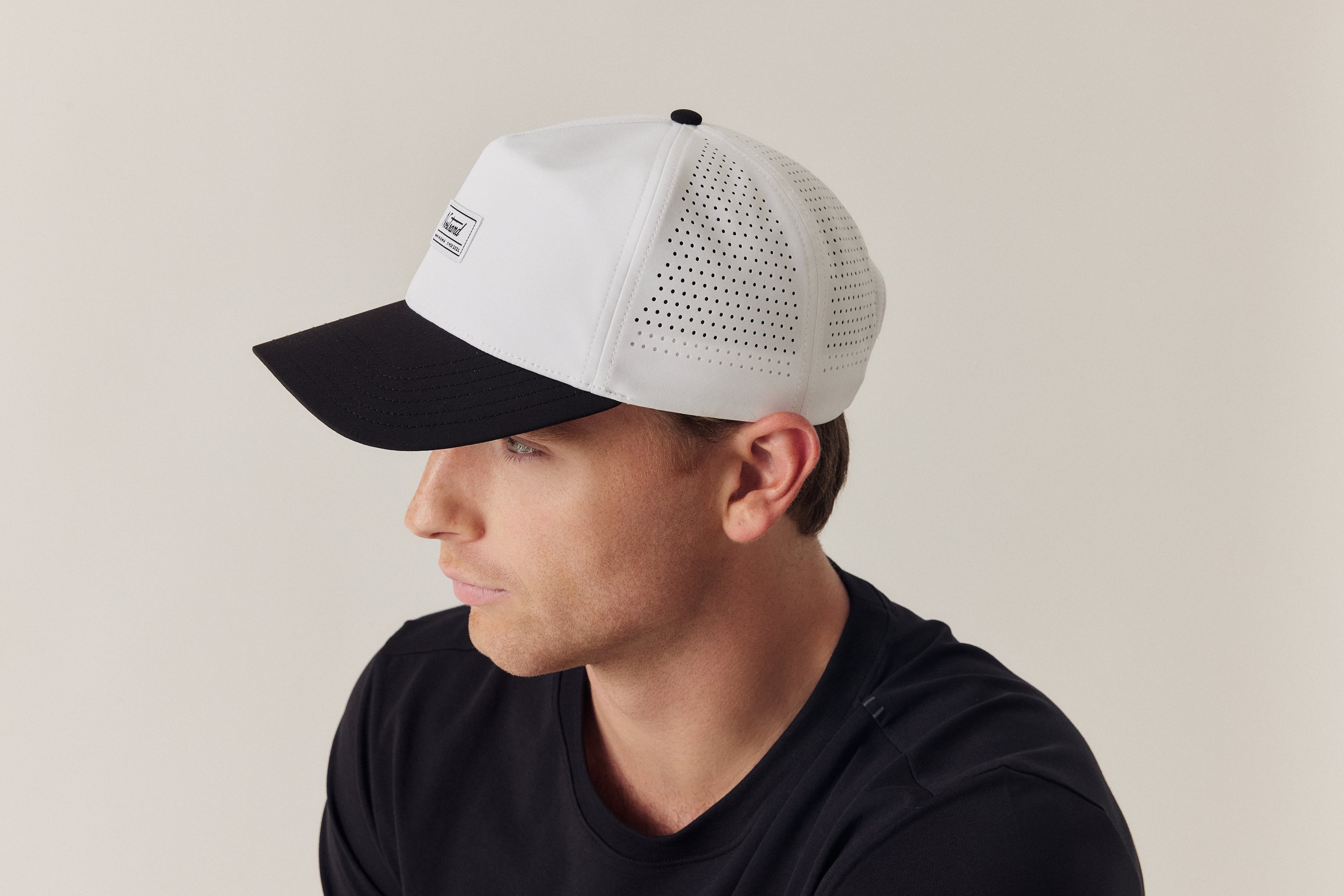 Drew in the two-tone Daily Tech Hat
