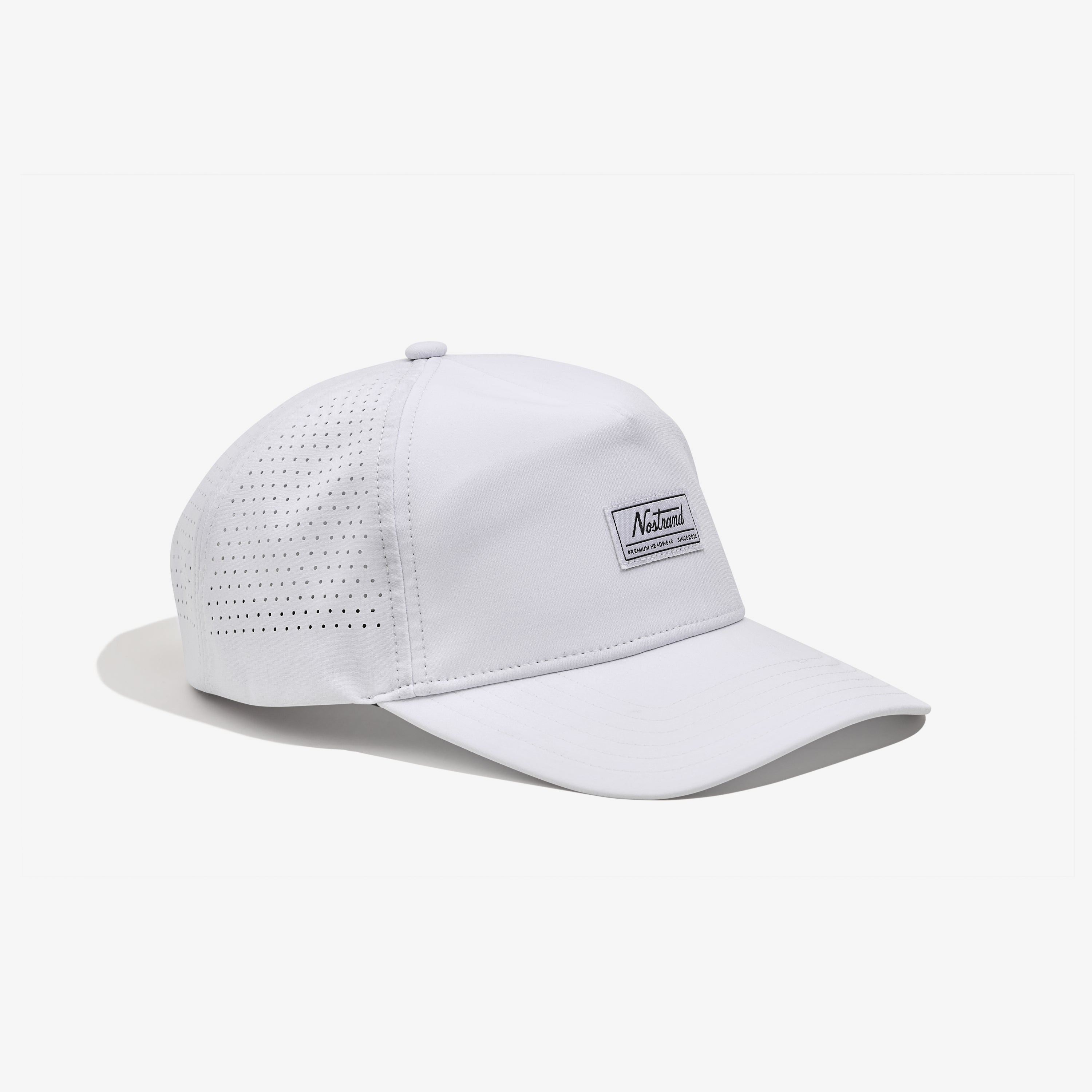 White athletic baseball cap with perforated side panels, mesh insert behind front panel, semi-curved brim, and small rectangular brand logo woven label on front of hat - Daily Tech Hat White