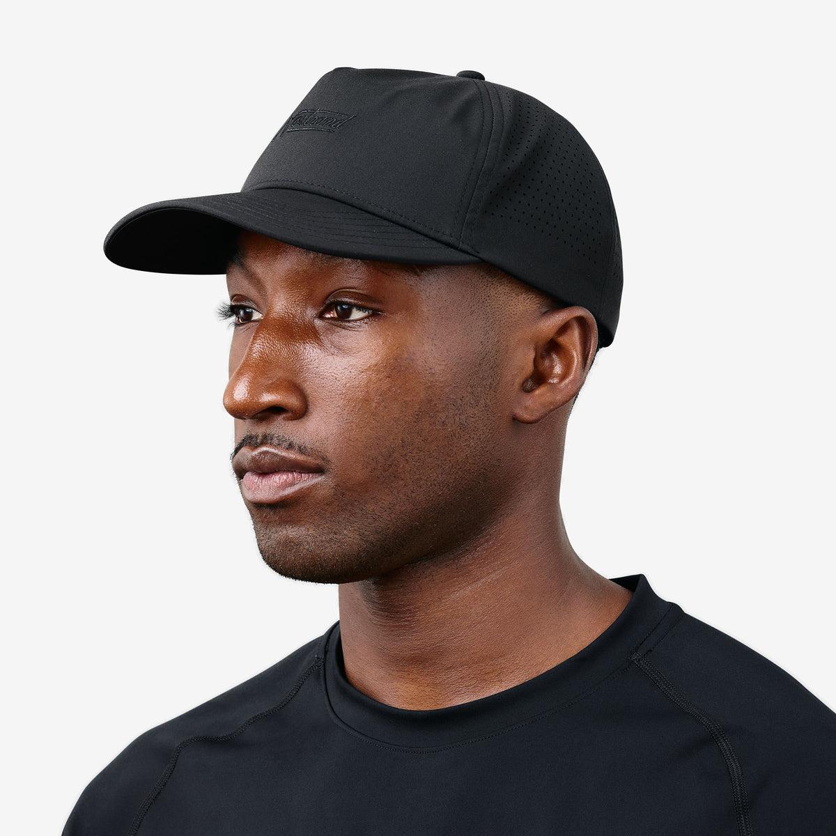 Black Daily Tech Hat on a model